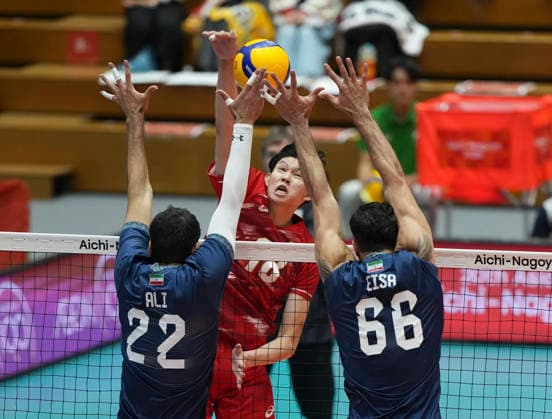 (261003) -- OKAZAKI, Oct. 3, 2026 -- Ali Haghparast (L, front) and Seyed Eisa Naseri Chenari (R, front) of Iran block the ball during the men s volleyball final match between Japan and Iran at the 20th Asian Games Aichi-Nagoya 2026 in Okazaki of Aichi Prefecture, Japan, Oct. 3, 2026. ) (SP)JAPAN-OKAZAKI-ASIAN GAMES-VOLLEYBALL-MEN S FINAL-JPN VS IRI JiaxYuchen 