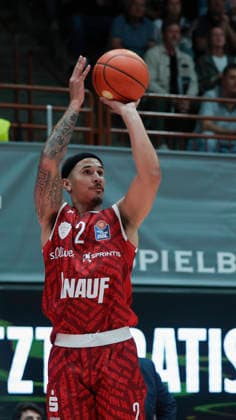 Pictured: Max Jones of the Würzburg Baskets, No. 2, making a three-pointer on October 2, 2026, Fitness First Würzburg Baskets vs. Telekom Baskets Bonn, easyCredit BBL, Matchday 4, Germany, 97072, tectake Arena Würzburg, Copyright: HMBxMedia xJulienxBecker