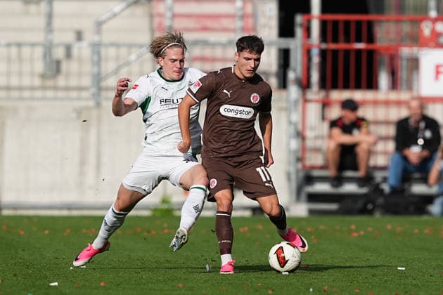 October 3, 2026, xydrx, Men s, Soccer, Friendly Match, FC St. Pauli vs. Borussia Mönchengladbach, 2026–2027 Season, Millerntor Stadium, David Herold, Borussia Mönchengladbach, No. 20 in a tackle against Arkadiusz Pyrka of FC St. Pauli, No. 11. DFB regulations prohibit any use of photographs as image sequences and or quasi-video. Copyright: HMBxMedia YannisxDreimann