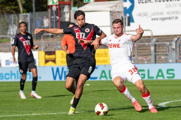 Tackle between Jakob Sachse of FC Viktoria Köln, No. 09, and Luis Stapelmann of 1. FC Köln, No. 38; FC Viktoria Köln vs. FC Hansa Rostock, Soccer, 3. Liga, Matchday 5, 2026–2027 Season, September 11, 2026 DFL DFB regulations prohibit any use of photographs as image sequences and or quasi-video FC Viktoria Cologne vs. FC Hansa Rostock, soccer, 3rd Division, Matchday 5, 2026–2027 season, September 11, 2026, Cologne Copyright: xEibner-Pressefoto ThomasxHaeslerx EP_THR
