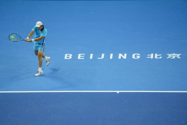 (261003) -- BEIJING, Oct. 3, 2026 -- Shang Juncheng of China hits a return to Alexander Zverev of Germany during the men s singles second round match at 2026 China Open tennis tournament in Beijing, China, Oct. 3, 2026. ) (SP)CHINA-BEIJING-TENNIS-CHINA OPEN-MEN S SINGLES(CN) XiexHan 