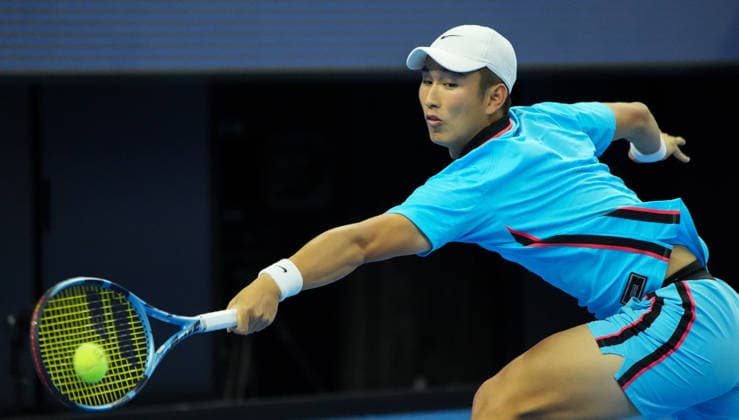 (261003) -- BEIJING, Oct. 3, 2026 -- Shang Juncheng of China hits a return to Alexander Zverev of Germany during the men s singles second round match at 2026 China Open tennis tournament in Beijing, China, Oct. 3, 2026. ) (SP)CHINA-BEIJING-TENNIS-CHINA OPEN-MEN S SINGLES(CN) XiexHan 