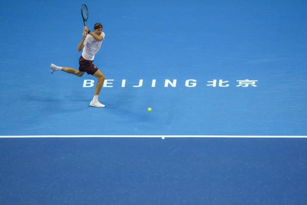 (261003) -- BEIJING, Oct. 3, 2026 -- Alexander Zverev of Germany hits a return to Shang Juncheng of China during the men s singles second round match at 2026 China Open tennis tournament in Beijing, China, Oct. 3, 2026. ) (SP)CHINA-BEIJING-TENNIS-CHINA OPEN-MEN S SINGLES(CN) XiexHan 