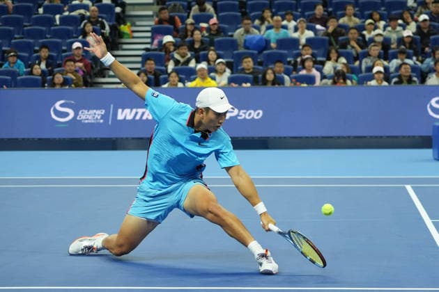 (261003) -- BEIJING, Oct. 3, 2026 -- Shang Juncheng of China hits a return to Alexander Zverev of Germany during the men s singles second round match at 2026 China Open tennis tournament in Beijing, China, Oct. 3, 2026. ) (SP)CHINA-BEIJING-TENNIS-CHINA OPEN-MEN S SINGLES(CN) XiexHan 