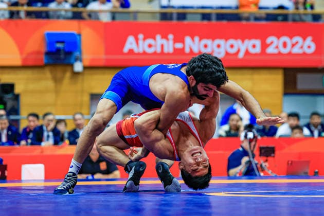 Asian Games, 57 kg Freestyle: Aman Aman (IND) def. Chongsong Han (PRK) Copyright: xAmirrezaxAliasgarix