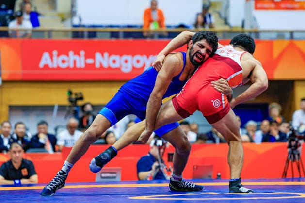 Asian Games, 57 kg Freestyle: Aman Aman (IND) def. Chongsong Han (PRK) Copyright: xAmirrezaxAliasgarix