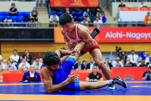 Asian Games, 57 kg Freestyle: Aman Aman (IND) def. Chongsong Han (PRK) Copyright: xAmirrezaxAliasgarix