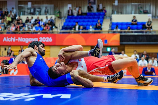 Asian Games, 57 kg Freestyle: Aman Aman (IND) def. Chongsong Han (PRK) Copyright: xAmirrezaxAliasgarix