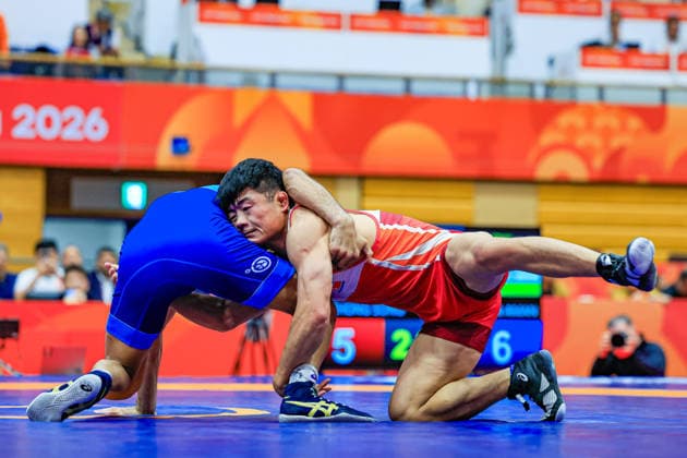 Asian Games, 57 kg Freestyle: Aman Aman (IND) def. Chongsong Han (PRK) Copyright: xAmirrezaxAliasgarix