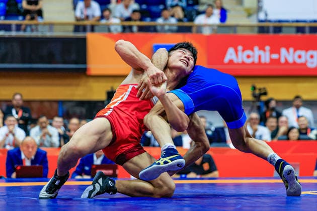 Asian Games, 57 kg Freestyle: Aman Aman (IND) def. Chongsong Han (PRK) Copyright: xAmirrezaxAliasgarix