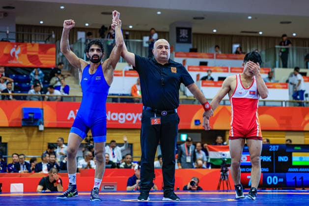 Asian Games, 57 kg Freestyle: Aman Aman (IND) def. Chongsong Han (PRK) Copyright: xAmirrezaxAliasgarix