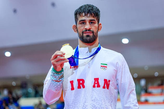 Asian Games Podium: 74 kg Freestyle Gold—Yones Aliakbar Emamichoghaei (IRI) Copyright: xAmirrezaxAliasgarix