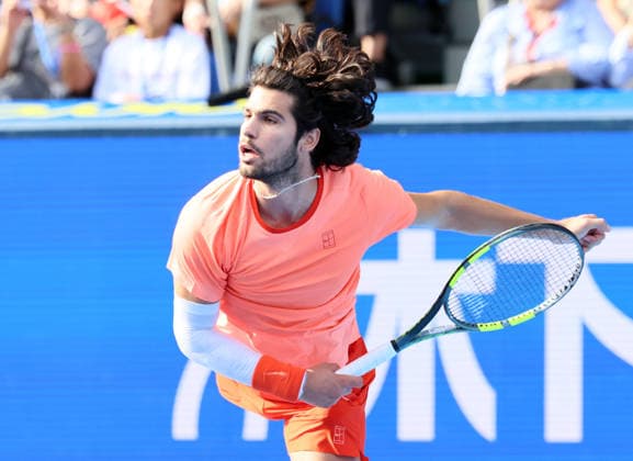 October 3, 2026, Tokyo, Japan - Carlos Alcaraz of Spain delivers a service against Matteo Arnaldi of Italy during the second round match of the Japan Open tennis championships at the Ariake Colosseum in Tokyo on Saturday, October 3, 2026. (photo by Yoshio Tsunoda AFLO) Noxthirdxpartyxsales  0868466239st YoshioxTsunodax
