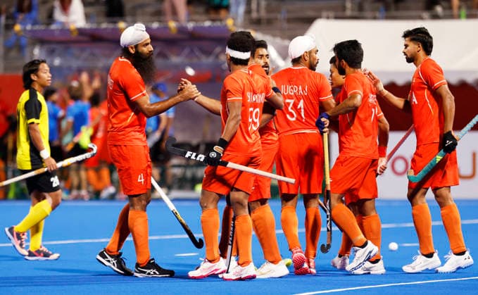 Asian Games - Aichi-Nagoya 2026 Kakamigahara Japan , Oct 03 (ANI): Asian Games - Aichi-Nagoya 2026 - Field hockey, Feldhockey - Men - Gold Medal Match - India v Malaysia - Gifu Prefectural Green Stadium, Kakamigahara, Japan - October 3, 2026 India s Harmanpreet Singh celebrates scoring their first goal through penalty corner with teammates REUTERS Manami Yamada ANI Photo KAKAMIGAHARA Japan Copyright: xREUTERSx ANI_20261003268