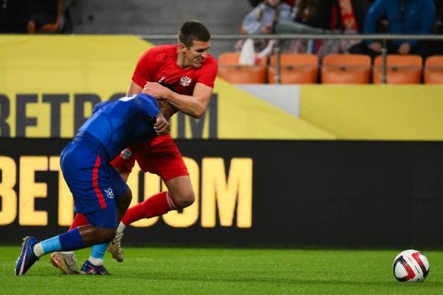 Russia Soccer Friendly Russia - Namibia 9256895 03.10.2026 Russia s Aleksandr Sobolev struggles for a ball during the friendly soccer match between Russia and Namibia at Yekaterinburg Arena in Yekaterinburg, Russia. Grigory Sysoev Sputnik Yekaterinburg Sverdlovsk Oblast Region Russia  Copyright: xGrigoryxSysoevx