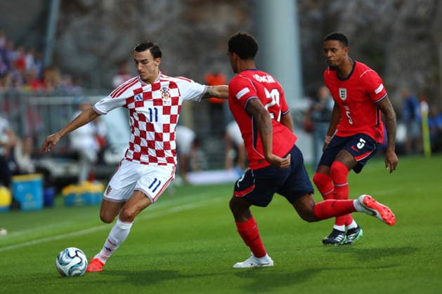 Rijeka, Croatia, 3rd October 2026. UEFA Nations League. Matchday 3, Group A3. Croatia v England at Rujevica, Rijeka. Petar MUSA (11) and Jarell QUANSAH (22) and Ezri KONSA (5) Croatia v England, UEFA Nations League. 