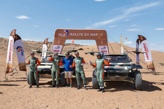 W2RC - RALLYE DU MAROC 2026 223 MORAES Lucas (bra), MORENO Pablo (esp), Dacia Sandrider, The Dacia Sandriders, FIA W2RC, ULT T1+, action, 299 AL ATTIYAH Nasser (qat), LURQUIN Fabian (bel), Dacia Sandrider, The Dacia Sandriders, FIA W2RC, ULT T1+, action Finisher podium, portrait during the Stage 5 of the Rallye du Maroc 2026, 4th round of the 2026 WR2C Championship from October 3, 2026 around Zagora, Morocco - AgadirMorocco  Copyright: xPauloxMariax