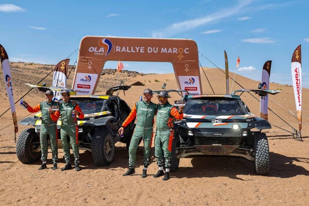 W2RC - RALLYE DU MAROC 2026 223 MORAES Lucas (bra), MORENO Pablo (esp), Dacia Sandrider, The Dacia Sandriders, FIA W2RC, ULT T1+, action, 299 AL ATTIYAH Nasser (qat), LURQUIN Fabian (bel), Dacia Sandrider, The Dacia Sandriders, FIA W2RC, ULT T1+, action Finisher podium, portrait during the Stage 5 of the Rallye du Maroc 2026, 4th round of the 2026 WR2C Championship from October 3, 2026 around Zagora, Morocco - AgadirMorocco  Copyright: xPauloxMariax