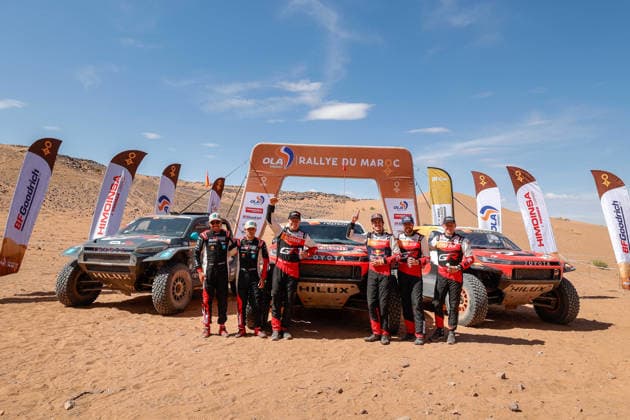 W2RC - RALLYE DU MAROC 2026 240 FERREIRA Joao (por), PALMEIRO Filipe (por), Toyota Hilux IMT Evo, Toyota Gazoo Racing SA, FIA W2RC, ULT T1+, action, 203 QUINTERO Seth (usa), SHORT Andrew (usa), Toyota Hilux GR, Toyota Gazoo Racing W2RC, FIA W2RC, ULT T1+, action, 202 LATEGAN Henk (rsa), CUMMINGS Brett (rsa), Toyota Hilux GR, Toyota Gazoo Racing W2RC, FIA W2RC,ULT T1+, action Finisher podium, portrait during the Stage 5 of the Rallye du Maroc 2026, 4th round of the 2026 WR2C Championship from October 3, 2026 around Zagora, Morocco - AgadirMorocco  Copyright: xPauloxMariax
