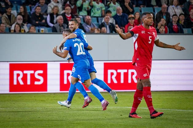 Soccer: UEFA Nations League 2026–2027, Matchday 3: Switzerland vs. Slovenia at Thermoplan Arena Lucerne; Goal and celebration after Zan Vipotnik (Slovenia) scores the 0–1, 18; Joy, emotion, and celebration with Aljosa Matko (Slovenia), 20; Manuel Akanji (Switzerland), 5, shocked Copyright: xJOERANxSTEINSIEKx
