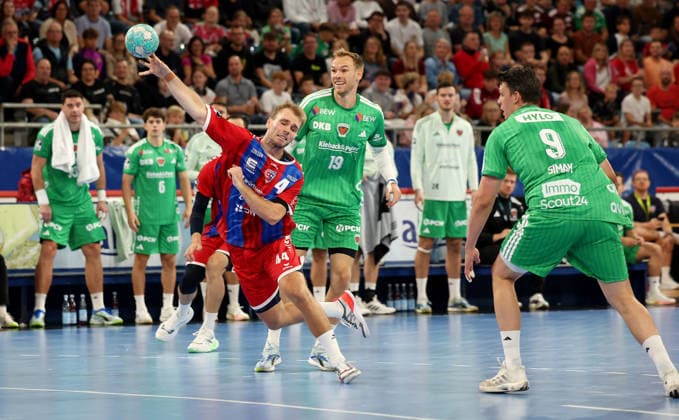 October 3, 2026, Germany, Bietigheim: SG BBM Bietigheim vs. Berliner Füchse; from left: Mathias Rohde Larson (BBM), Mathias Gidsel (Berlin)