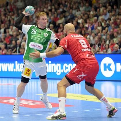 Jonathan Edvardsson (TSV Hannover Burgdorf 26) takes a shot; Adrian Sipos (MT Melsungen 8), GER, MT Melsungen vs. TSV Hannover Burgdorf, handball, 1st Bundesliga, Matchday 7, 2026–2027 season, October 3, 2026, GER, MT Melsungen vs. Hannover Burgdorf, Handball, 1st Bundesliga, Matchday 7, 2026–2027 season, October 3, 2026, Kassel Copyright: xEibner-Pressefotox xRolandxSippelx EP_RSL