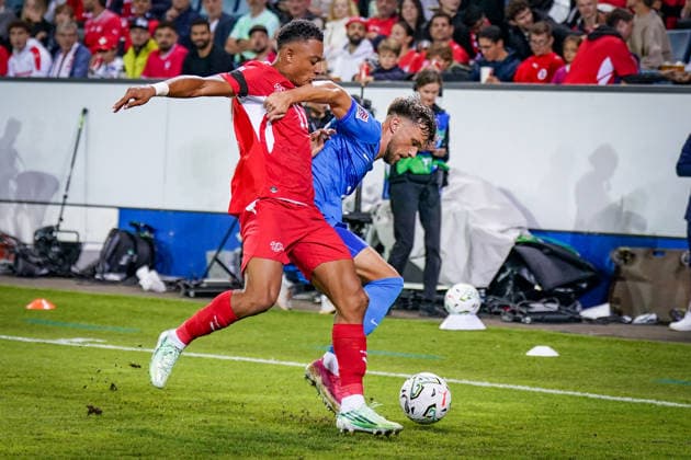 Soccer: UEFA Nations League 2026–2027, Matchday 3: Switzerland vs. Slovenia at Thermoplan Arena Lucerne—Dan Ndoye (Switzerland, No. 11) and David Brekalo (Slovenia, No. 23) in a tackle Copyright: xJOERANxSTEINSIEKx