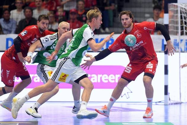 Marian Michalczik, TSV Hannover Burgdorf, 22 (on the ball), Johannes Golla, MT Melsungen, 14, Justus Fischer, TSV Hannover Burgdorf, 54 L, GER, MT Melsungen vs. TSV Hannover Burgdorf, Handball, Bundesliga 1, Matchday 7, 2026–2027 Season, October 3, 2026, GER, MT Melsungen vs. Hannover Burgdorf, Handball, Bundesliga 1, Matchday 7, 2026–2027 season, October 3, 2026, Kassel Copyright: xEibner-Pressefotox xRolandxSippelx EP_RSL