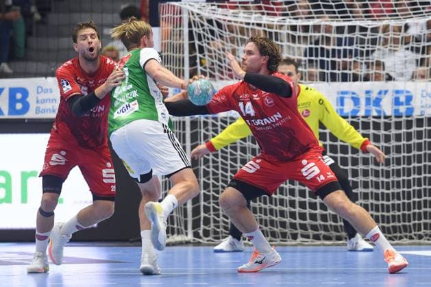 Marian Michalczik, TSV Hannover Burgdorf, 22 (on the ball); Johannes Golla, MT Melsungen, 14 (R); Olle Forsell Schefvert, MT Melsungen, 25 (L); GER, MT Melsungen vs. TSV Hannover Burgdorf, Handball, 1st Bundesliga, Matchday 7, 2026–2027 season, October 3, 2026, GER, MT Melsungen vs. Hannover Burgdorf, Handball, 1st Bundesliga, Matchday 7, 2026–2027 season, October 3, 2026, Kassel Copyright: xEibner-Pressefotox xRolandxSippelx EP_RSL