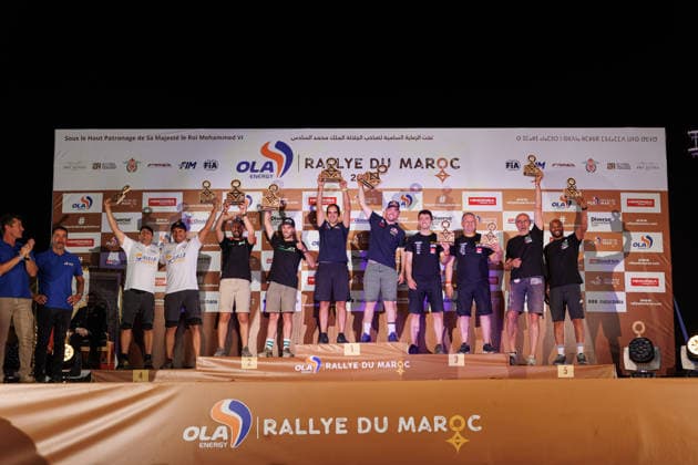 W2RC - RALLYE DU MAROC 2026 412 WALKNER Matthias (aut), MENA Oriol (esp), BRP Can-Am Maverick R, South Racing Can-Am, SSV SSV1, 421 DELDOSSI AndrÃ a (fra), TRICAUD JÃ rÃ my (fra), BRP Can-Am Maverick R, BTR, SSV SSV1, 401 GONZALEZ FERIOLI Jeremias (arg), RINALDI Gonzalo (arg), BRP Can-Am Maverick R, Can-Am Factory Team, SSV SSV1, podium, portrait, during the the Podium and Prize Giving Ceremony of the Rallye du Maroc 2026, 4th round of the 2026 WR2C Championship from October 3, 2026 around Zagora, Morocco - AgadirMorocco  Copyright: xFREDERICxLExFLOCxHx