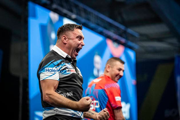 RECORD DATE NOT STATED 3rd October 2026; Mattioli Arena, Leicester, England; PDC World Grand Prix Darts Day 6; Gerwyn Price arrives on stage for his semi final match against Nathan Aspinall and roars for the fans an his opponent smiles GodfreyxPitt