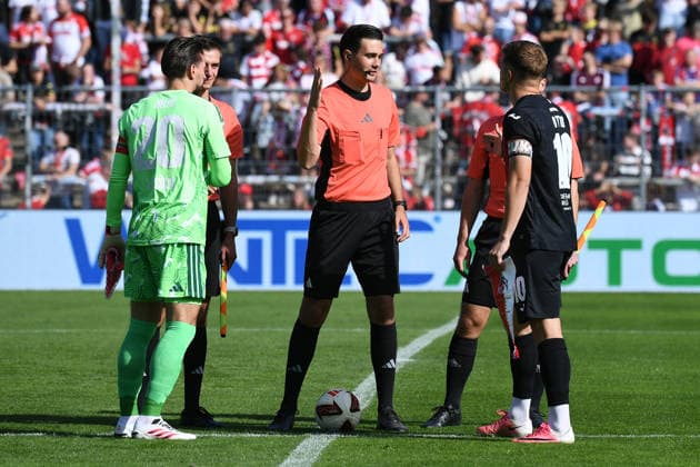 Soccer friendly match: FC Viktoria Köln vs. 1. FC Köln on October 3, 2026, at Sportpark Höhenberg in Cologne. Coin toss: Ron Robert Zieler (Cologne), left; referee Nils Leichert, center; David Otto (Cologne), right xRx
