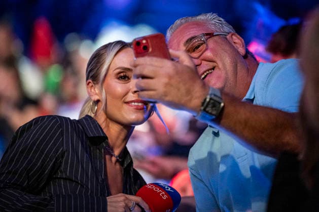 RECORD DATE NOT STATED 3rd October 2026; Mattioli Arena, Leicester, England; PDC World Grand Prix Darts Day 6; Sky Sports presenter Emma Paton has a selfie with a fan before the match starts GodfreyxPitt