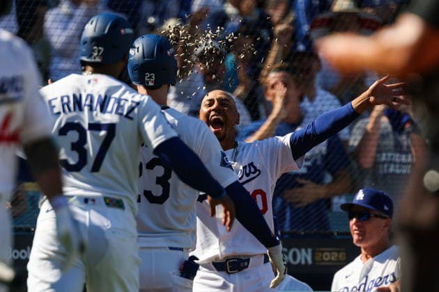 MLB, Baseball Herren, USA National League Division Series - Dodgers vs Braves Game 1 Los Angeles Dodgers shortstop Mookie Betts (R) celebrates with outfielder Kyle Tucker (2-R) after hitting a two-run home run during the sixth inning in Game 1 of the National League Division Series between the Atlanta Braves and the Los Angeles Dodgers at UNIQLO Field at Dodger Stadium in Los Angeles, California, USA, 03 October 2026. LOS ANGELES CALIFORNIA UNITED STATES  Copyright: xCHRISxTORRESx