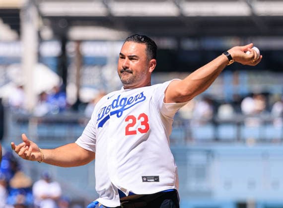 October 3, 2026, Los Angeles, California, USA: Former 1st base Dodger Adrian Fernandez throws the ceremonial first pitch before a NLDS Game 1 between the Los Angeles Dodgers and the Atlanta Braves on Saturday October 3, 2026 at Dodger Stadium in Los Angeles, California. JAVIER ROJAS PI Los Angeles USA - ZUMAp124 20261003_zaa_p124_039 Copyright: xJavierxRojasx