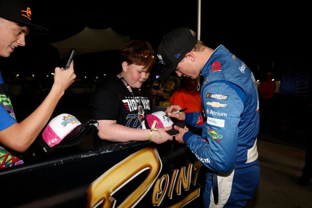 LAS VEGAS, CA - OCTOBER 03: Corey Day ( 17 Hendrick Motorsports HendrickCars.com Chevrolet) signs autographs in victory lane after winning the Focused Health 302 NASCAR, Motorsport, USA O™Reilly Auto Parts Series race on October 3, 2026, at Las Vegas Motor Speedway in Las Vegas, NV. (Photo by Jeff Speer LVMS Icon Sportswire) AUTO: OCT 03 NASCAR O™Reilly Auto Parts Series Focused Health 302 EDITORIAL USE ONLY Icon26100319016