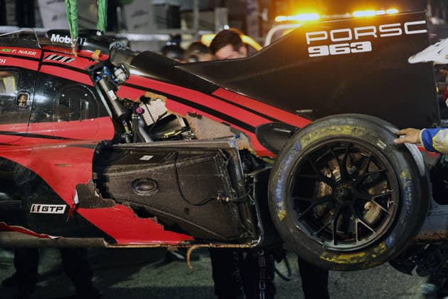 The Porsche 963 No. 7 driven by Felipe Nasr, Laurin Heinrich, and Julien Andlauer, which was severely damaged in an accident, is being pushed into the Porsche Penske tent at the 29th Motul Petit Le Mans race of the IMSA series at Road Atlanta, Georgia, USA, October 3, 2026, retired,