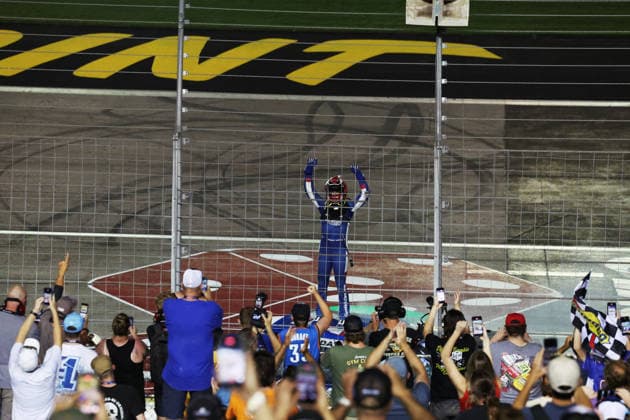 LAS VEGAS, CA - OCTOBER 03: Fans cheer as Corey Day ( 17 Hendrick Motorsports HendrickCars.com Chevrolet) celebrates from the roof of his car after winning the Focused Health 302 NASCAR, Motorsport, USA O™Reilly Auto Parts Series race on October 3, 2026, at Las Vegas Motor Speedway in Las Vegas, NV. (Photo by Ronda Churchill LVMS Icon Sportswire) AUTO: OCT 03 NASCAR O™Reilly Auto Parts Series Focused Health 302 EDITORIAL USE ONLY Icon26100316796