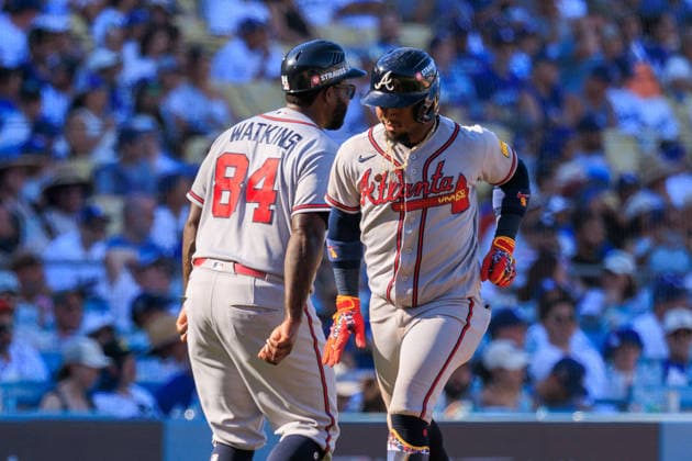 October 3, 2026, Los Angeles, California, USA: Ozzie Albies 1 of the Atlanta Braves high-fives third base coach after hitting a two-run home run in the 9th inning during NLDS Game 1 against the Los Angeles Dodgers on Saturday October 3, 2026 at Dodger Stadium in Los Angeles, California. Dodgers defeat Braves, 5-3, in NLDS Game 1. JAVIER ROJAS PI Los Angeles USA - ZUMAp124 20261003_zaa_p124_053 Copyright: xJavierxRojasx