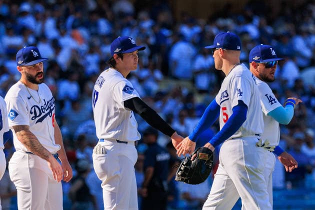 October 3, 2026, Los Angeles, California, USA: Shohei Ohtani 17 of the Los Angeles Dodgers exchanges a low-five with Freddie Freeman 5 in the postgame line after defeating the Atlanta Braves in NLDS Game 1 on Saturday, October 3, 2026, at Dodger Stadium in Los Angeles, California. Dodgers defeat Braves, 5-3, in NLDS Game 1. JAVIER ROJAS PI Los Angeles USA - ZUMAp124 20261003_zaa_p124_058 Copyright: xJavierxRojasx