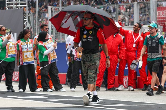SEPANG, SGR - OCTOBER 04: Lewis Hamilton of Great Britain and Scuderia Ferrari HP during driver s parade before the start of the race of the Formula 1 Gulf Air Bahrain Grand Prix on October 04, 2026 held at Sepang International Circuit in Sepang, Malaysia. (Photo by Hazrin Yeob Men Shah Icon Sportswire) AUTO: OCT 04 F1 Bahrain Grand Prix in Malaysia EDITORIAL USE ONLY Icon3782610042593