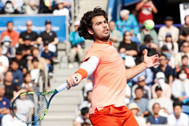 October 4, 2026, Tokyo, Japan: Carlos Alcaraz (Spain) returns a shot against Denis Shapovalov (Canada) during their quarterfinal match at the Kinoshita Group Japan Open Tennis Championships at Ariake Colosseum in Tokyo. Shapovalov suffered an injury, forcing him to retire early in the second set. The tournament runs from September 29 to October 6. Alcaraz won 7-6(3), 2-1 Tokyo Japan - ZUMAm191 20261004_aap_m191_088 Copyright: xRodrigoxReyesxMarinx