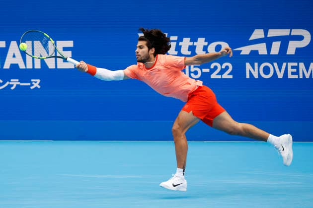 October 4, 2026, Tokyo, Japan: Carlos Alcaraz (Spain) returns a shot against Denis Shapovalov (Canada) during their quarterfinal match at the Kinoshita Group Japan Open Tennis Championships at Ariake Colosseum in Tokyo. Shapovalov suffered an injury, forcing him to retire early in the second set. The tournament runs from September 29 to October 6. Alcaraz won 7-6(3), 2-1 Tokyo Japan - ZUMAm191 20261004_aap_m191_083 Copyright: xRodrigoxReyesxMarinx