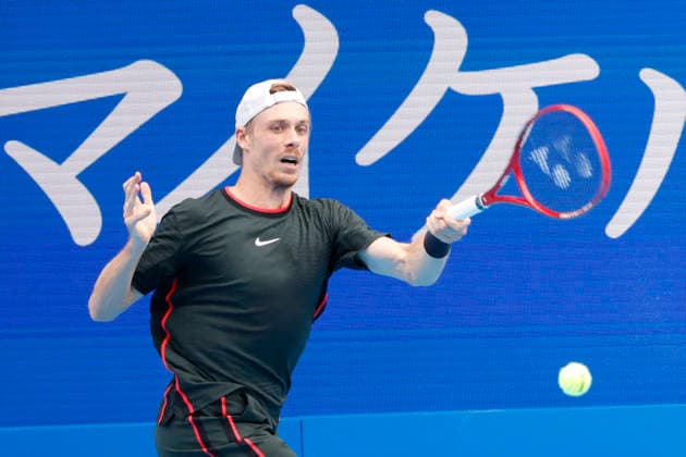 October 4, 2026, Tokyo, Japan: Denis Shapovalov (Canada) returns a shot against Carlos Alcaraz (Spain) during their quarterfinal match at the Kinoshita Group Japan Open Tennis Championships at Ariake Colosseum in Tokyo. Shapovalov suffered an injury, forcing him to retire early in the second set. The tournament runs from September 29 to October 6. Alcaraz won 7-6(3), 2-1 Tokyo Japan - ZUMAm191 20261004_aap_m191_086 Copyright: xRodrigoxReyesxMarinx