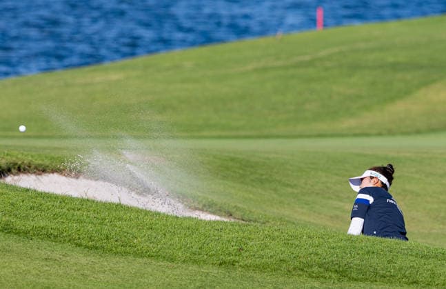 October 3, 2026, Honolulu, Hawaii, USA: MIYU YAMASHITA makes a chip shot from the bunker at the 18th green during Round 3 of the 2026 Lotte Championship at Hoakalei Country Club, Ewa Beach, Hawaii, USA. 2026 Lotte Championship Presented By Hoakalei  - ZUMAm310 20261003_zsp_m310_056 Copyright: xElliotxMilesx