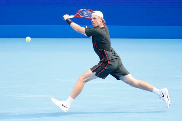 October 4, 2026, Tokyo, Japan: Denis Shapovalov (Canada) returns a shot against Carlos Alcaraz (Spain) during their quarterfinal match at the Kinoshita Group Japan Open Tennis Championships at Ariake Colosseum in Tokyo. Shapovalov suffered an injury, forcing him to retire early in the second set. The tournament runs from September 29 to October 6. Alcaraz won 7-6(3), 2-1 Tokyo Japan - ZUMAm191 20261004_aap_m191_069 Copyright: xRodrigoxReyesxMarinx