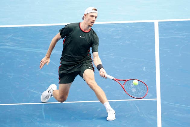 October 4, 2026, Tokyo, Japan: Denis Shapovalov (Canada) returns a shot against Carlos Alcaraz (Spain) during their quarterfinal match at the Kinoshita Group Japan Open Tennis Championships at Ariake Colosseum in Tokyo. Shapovalov suffered an injury, forcing him to retire early in the second set. The tournament runs from September 29 to October 6. Alcaraz won 7-6(3), 2-1 Tokyo Japan - ZUMAm191 20261004_aap_m191_061 Copyright: xRodrigoxReyesxMarinx