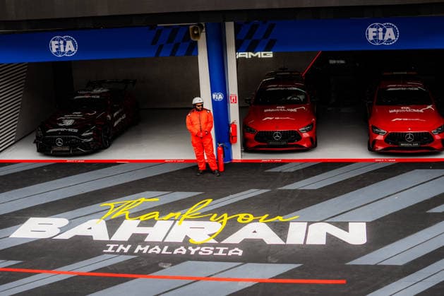 2026 Formula 1 Gulf Air Bahrain Grand Prix - Kuala Lumpur A race marshal stands with the safety car during the 2026 Formula 1 Gulf Air Bahrain Grand Prix at Sepang International Circuit in Kuala Lumpur, Malaysia on October 4, 2026. Photo by Antoine Lapeyre Reveries Agency ABACAPRESS.COM Kuala Lumpur Malaysia Copyright: xAntoinexLapeyre ReveriesxAgency ABACAx