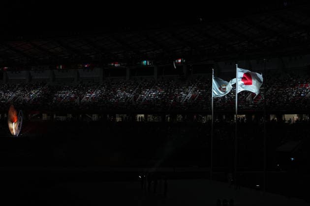 (261004) -- NAGOYA, Oct. 4, 2026 -- The national flag of Japan and flag of Olympic Council of Asia (OCA) are seen during the closing ceremony of the 20th Asian Games Aichi-Nagoya 2026 in Nagoya, Japan, Oct. 4, 2026. ) (SP)JAPAN-NAGOYA-ASIAN GAMES-CLOSING CEREMONY CheongxKamxKa