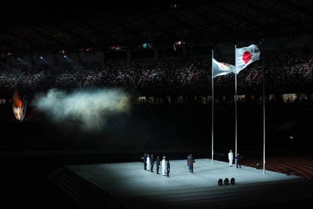(261004) -- NAGOYA, Oct. 4, 2026 -- The national flag of Japan and flag of Olympic Council of Asia (OCA) are seen during the closing ceremony of the 20th Asian Games Aichi-Nagoya 2026 in Nagoya, Japan, Oct. 4, 2026. ) (SP)JAPAN-NAGOYA-ASIAN GAMES-CLOSING CEREMONY CheongxKamxKa 